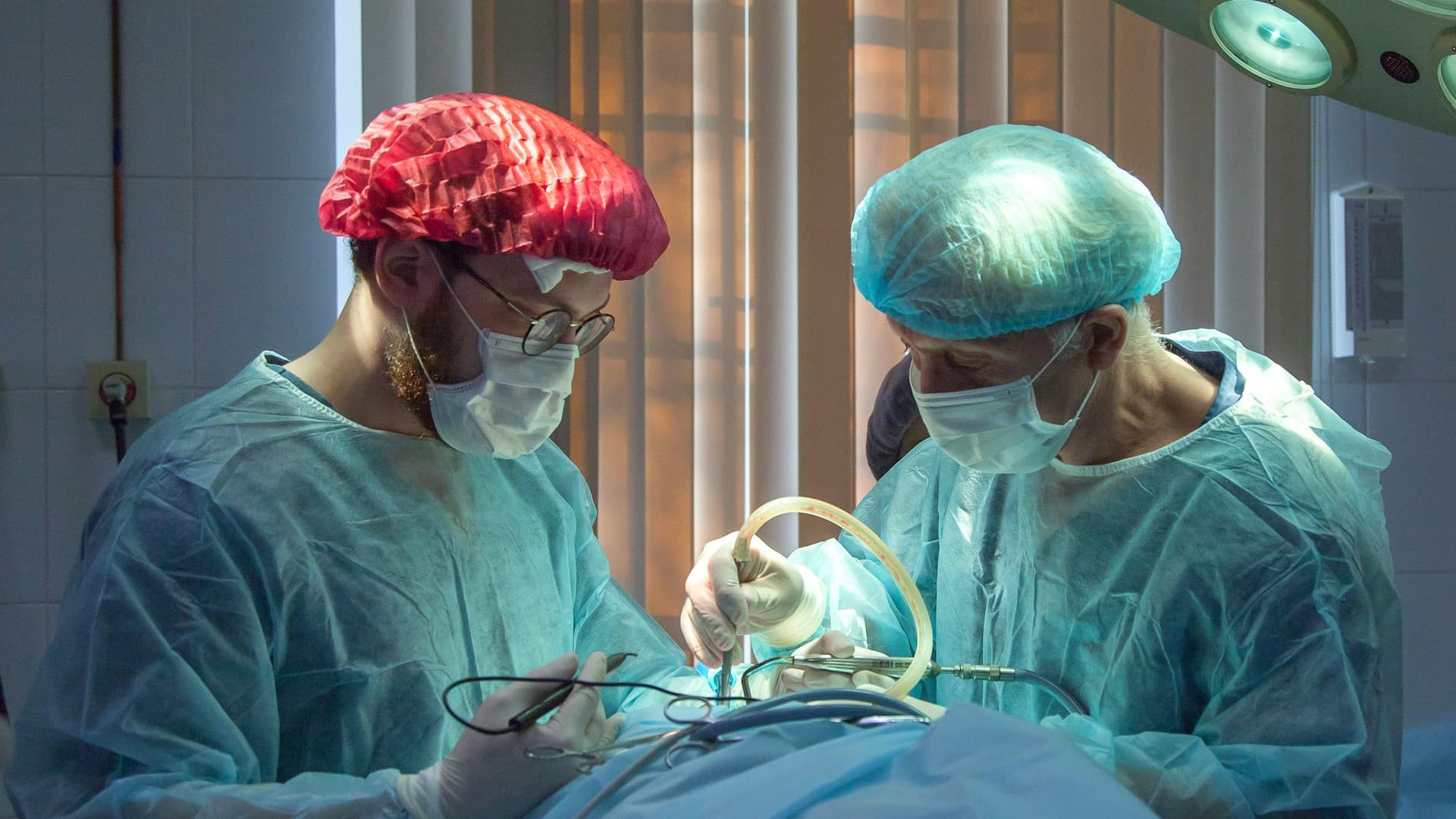 Healthcare professionals working in a clinical environment